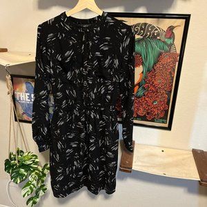 Black long sleeve dress with white brushstroke pattern